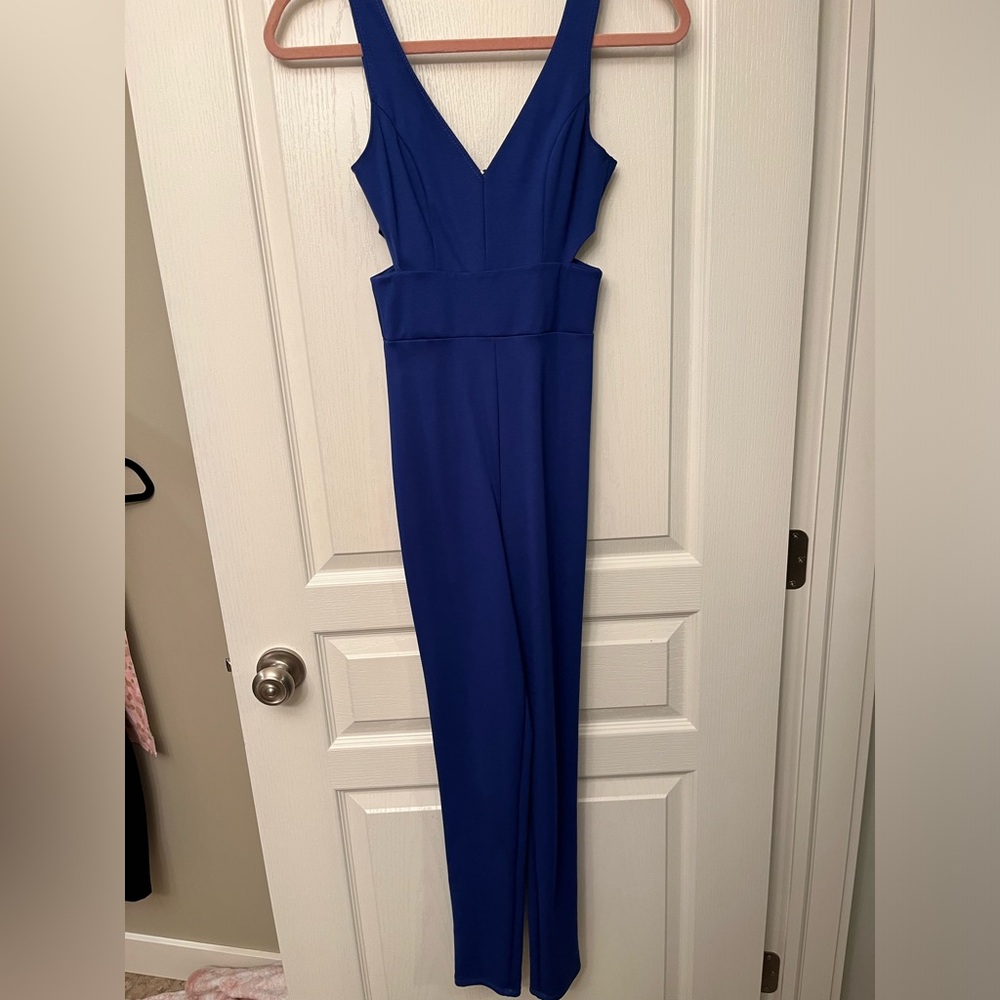 Blue jumpsuit with cutout details - never worn !